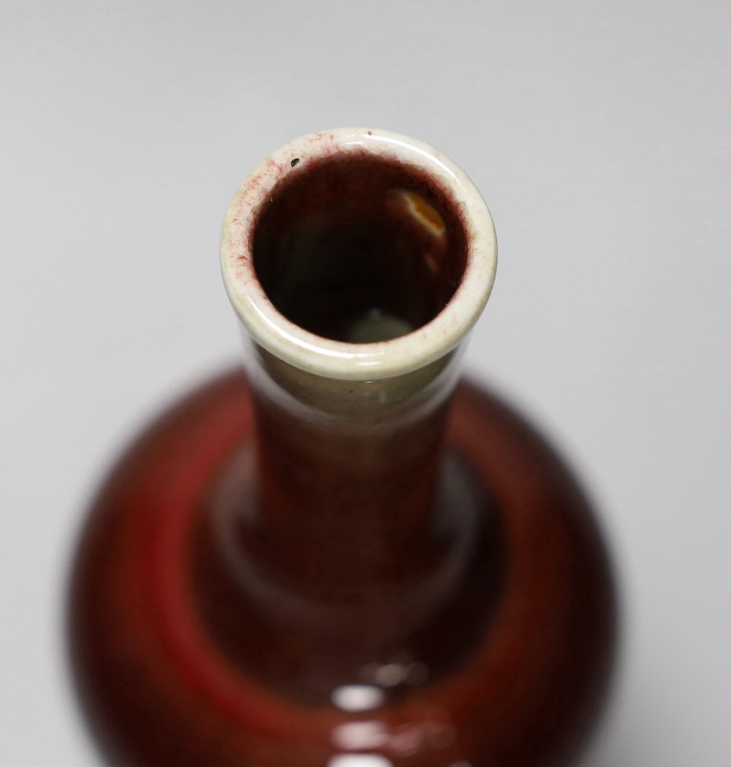 A Chinese sang de boeuf vase, 23cm